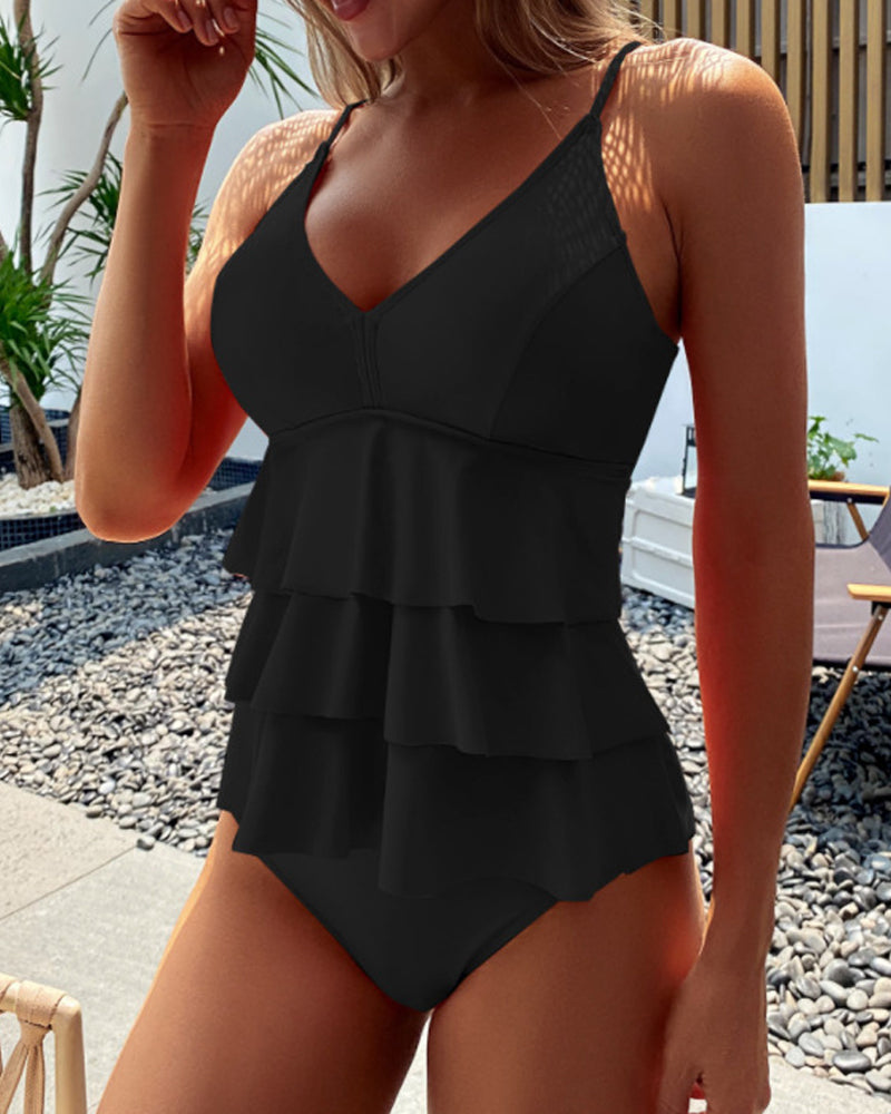 Elegant todelt ensfarget tankini for en stilfull badeopplevelse